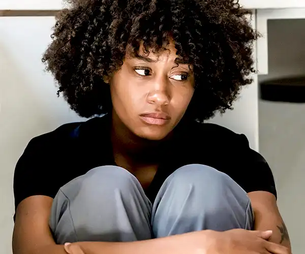 Young African American Female Suffering from Trauma